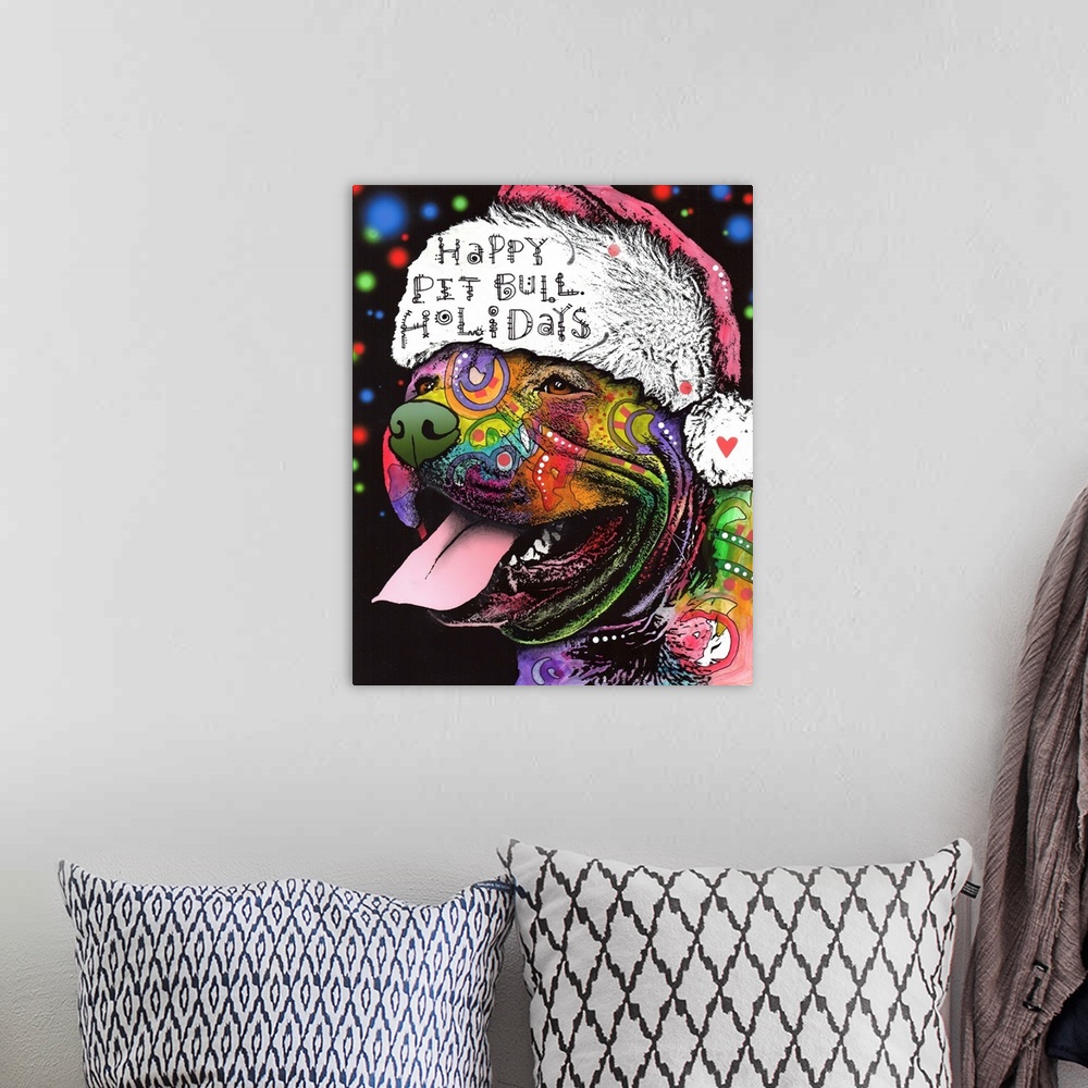 A bohemian room featuring "Happy Pit Bull Holidays" handwritten on a Santa hat that a happy pit bull covered in different c...