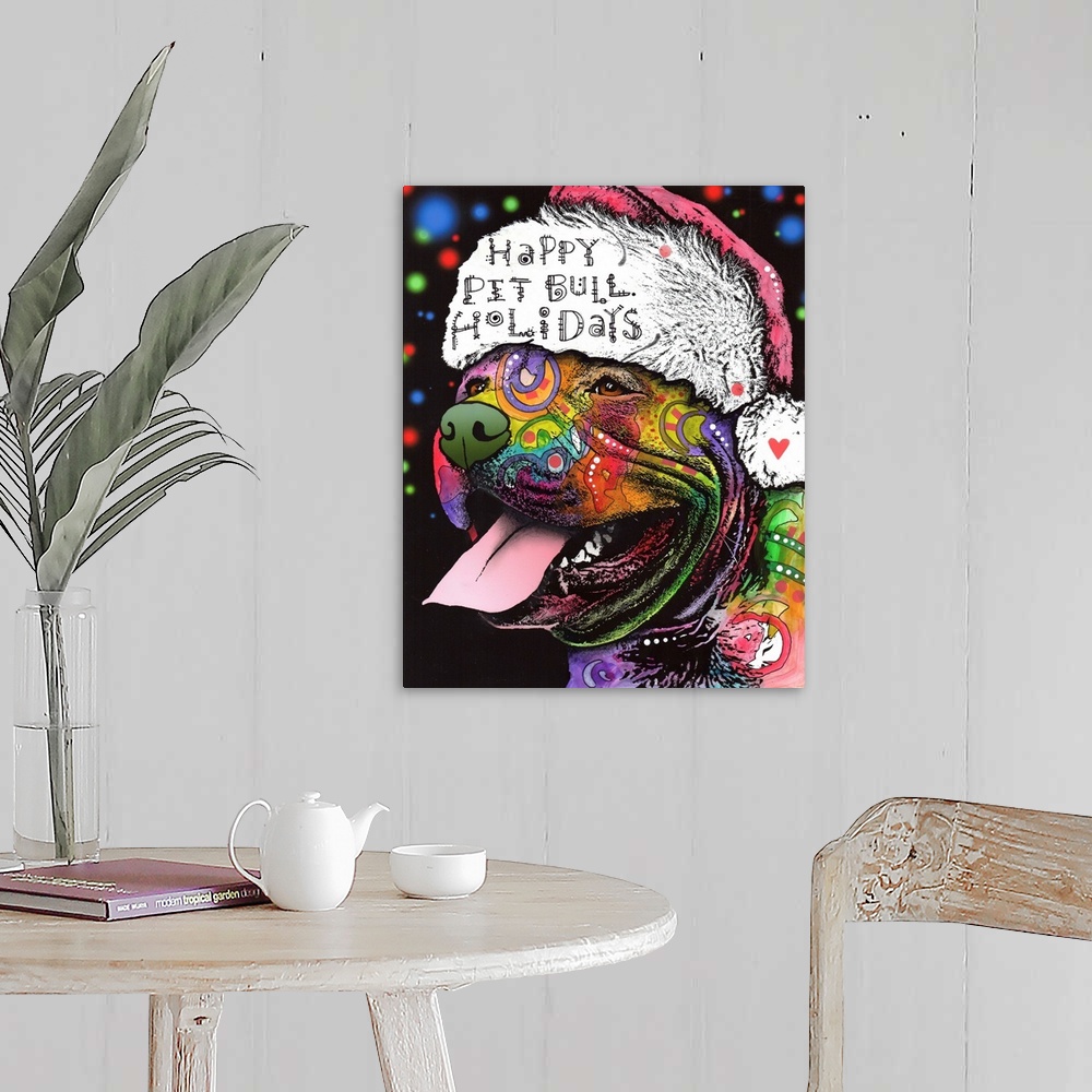 A farmhouse room featuring "Happy Pit Bull Holidays" handwritten on a Santa hat that a happy pit bull covered in different c...