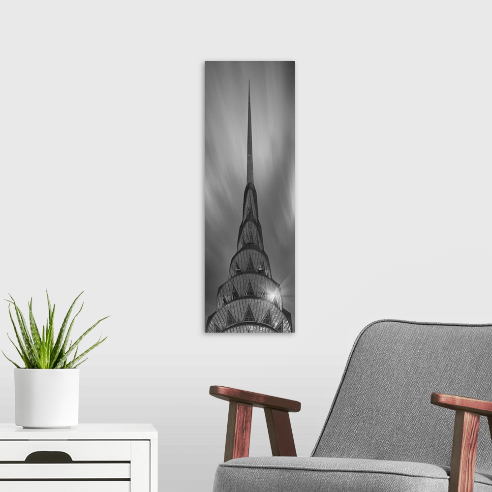 A modern room featuring A photograph of the Chrysler building taken in black and white.