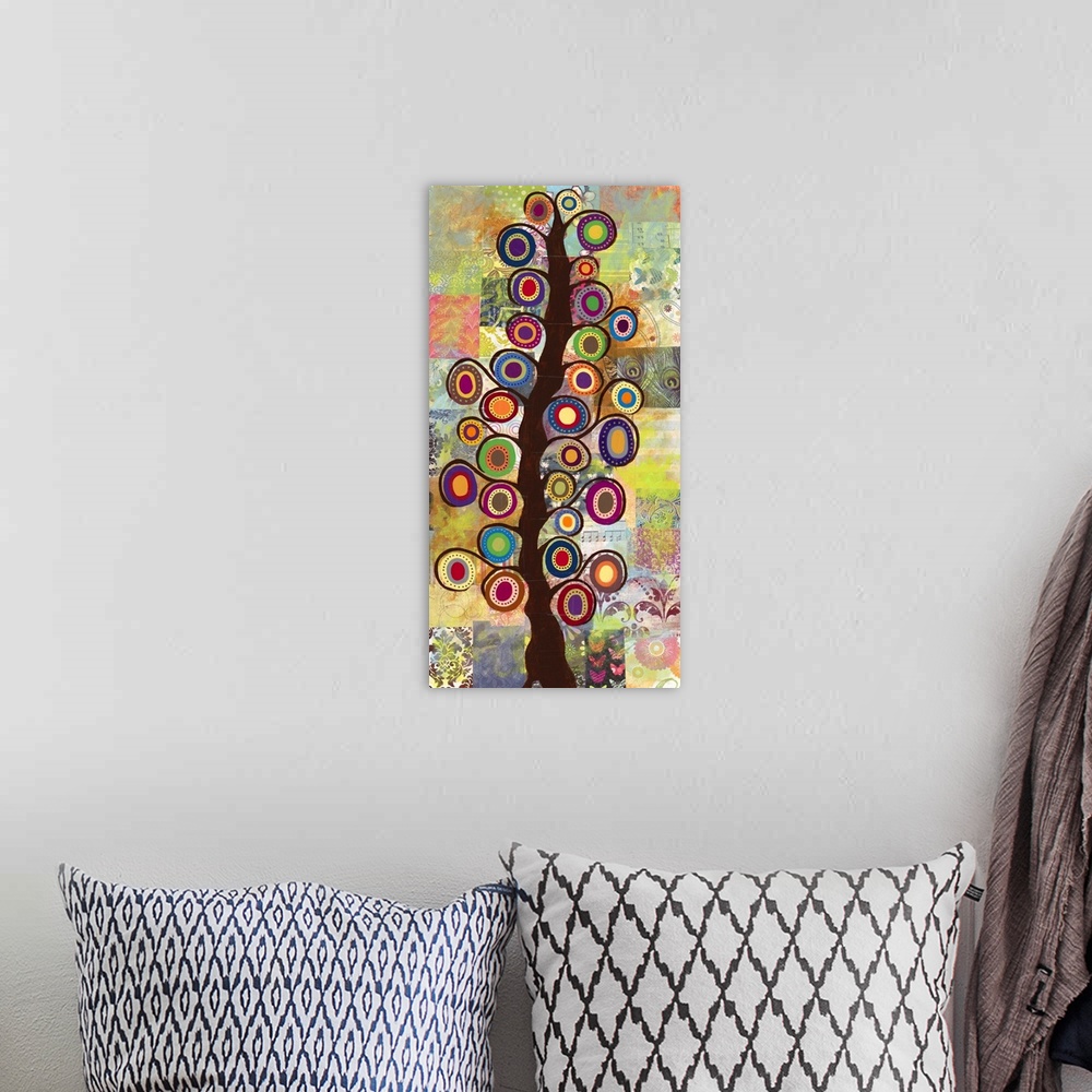 A bohemian room featuring Contemporary folk art painting of a tree with curled branches and round flowers on a patchwork-st...