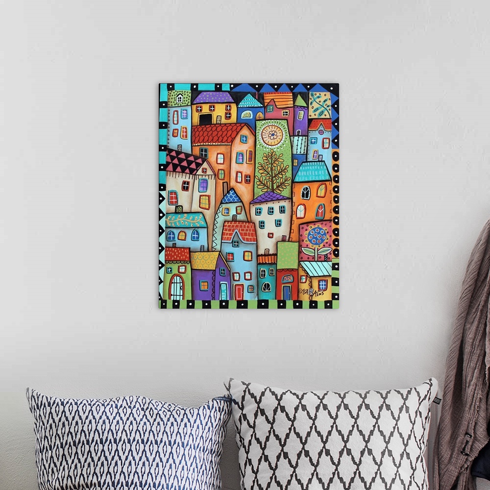 A bohemian room featuring Contemporary painting of a village made of different colored houses.