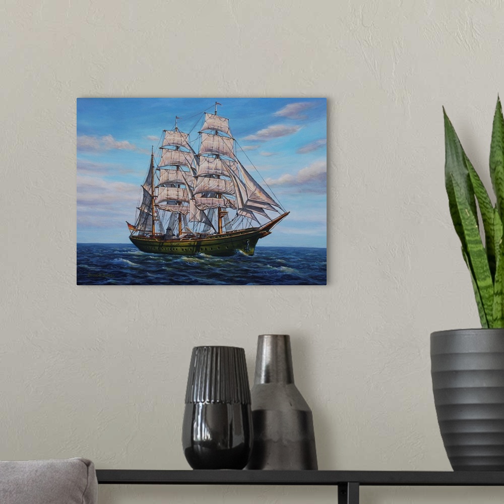 A modern room featuring Contemporary artwork of a large ship with several sails on the ocean.