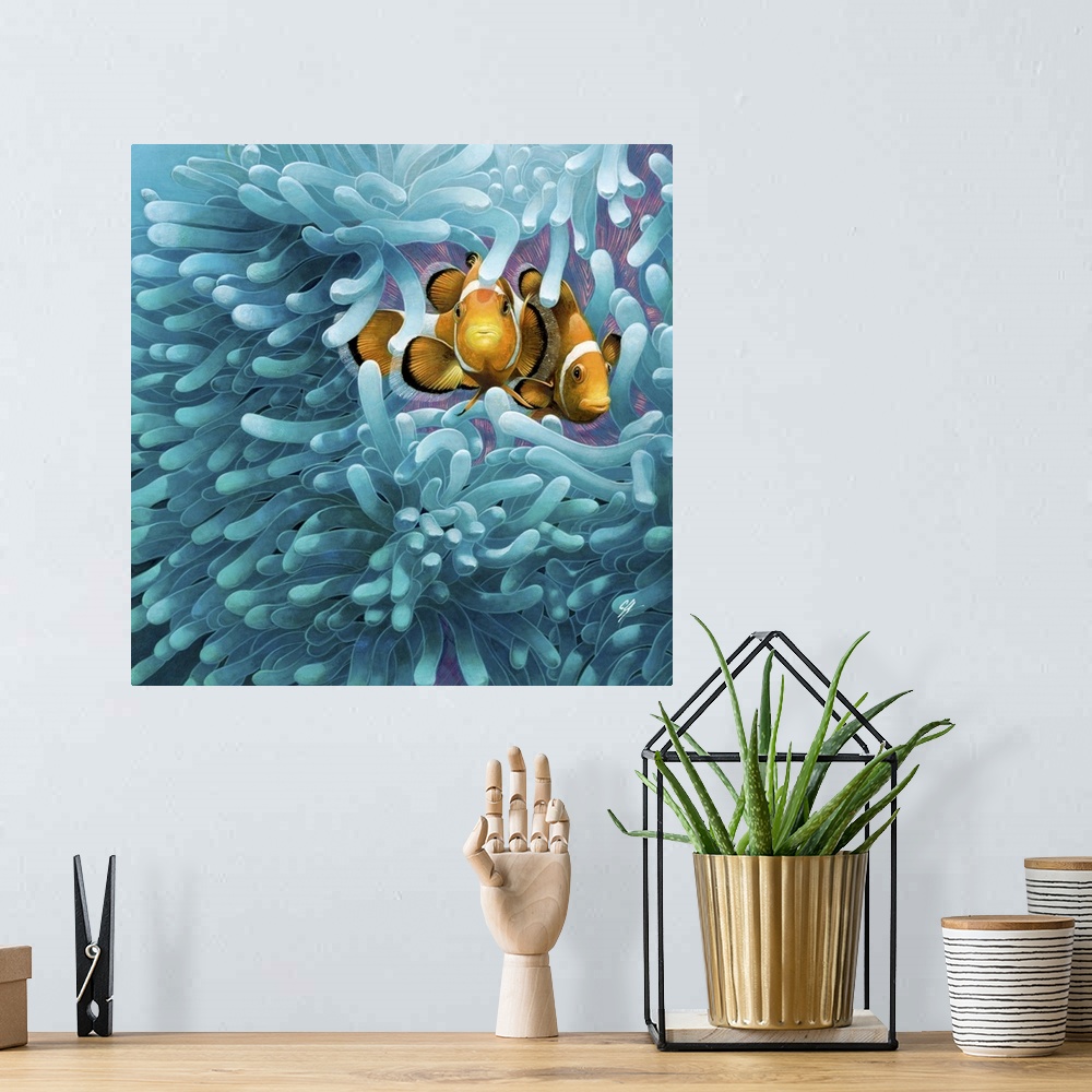 A bohemian room featuring Contemporary colorful artwork of a tropical fish swimming around a sea anemone.