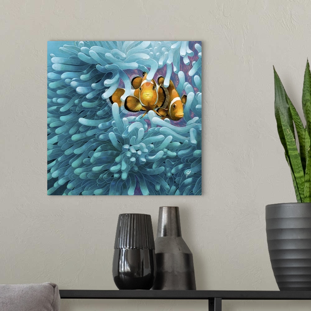 A modern room featuring Contemporary colorful artwork of a tropical fish swimming around a sea anemone.