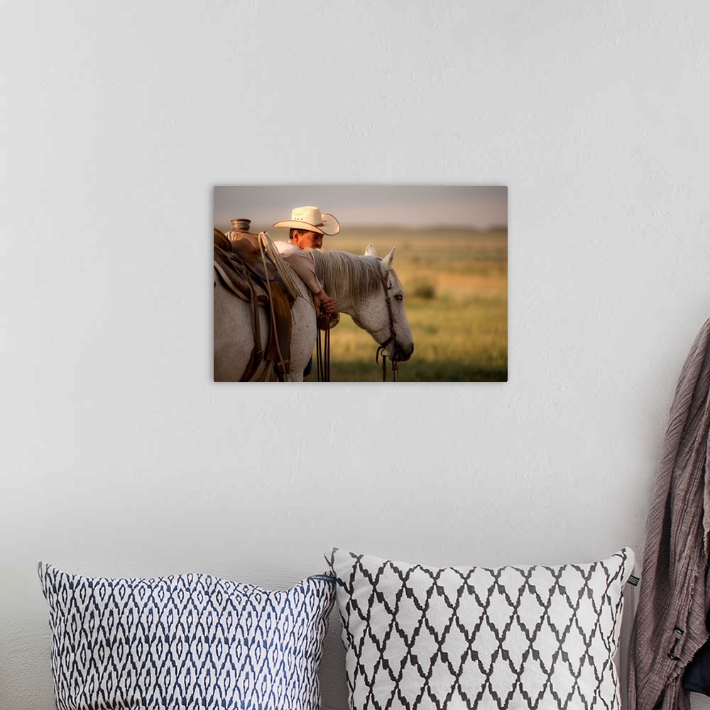 A bohemian room featuring Cowboy hugging his horse