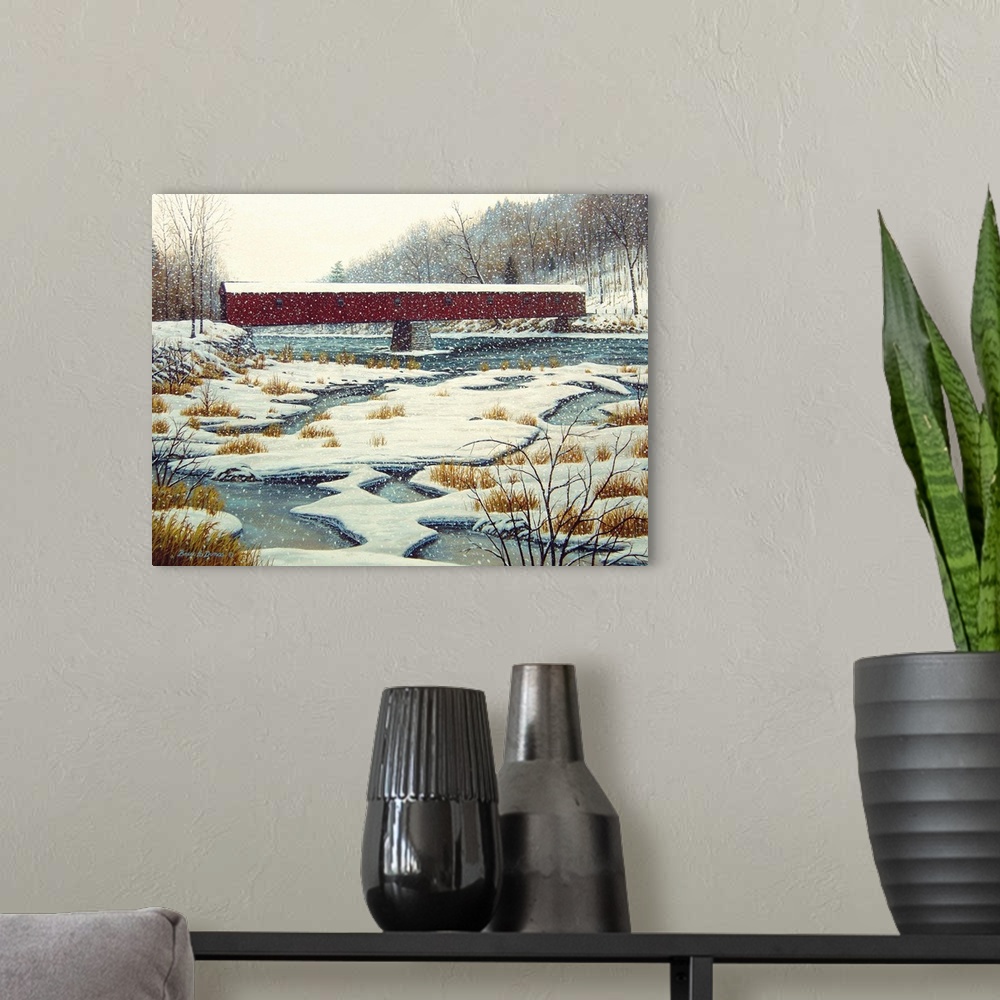 A modern room featuring Contemporary artwork of a covered bridge over a stream in winter time.