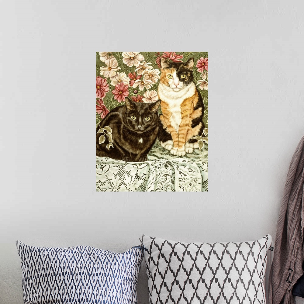A bohemian room featuring Painting of two cats on a lacy tablecloth on a table with some flowers.