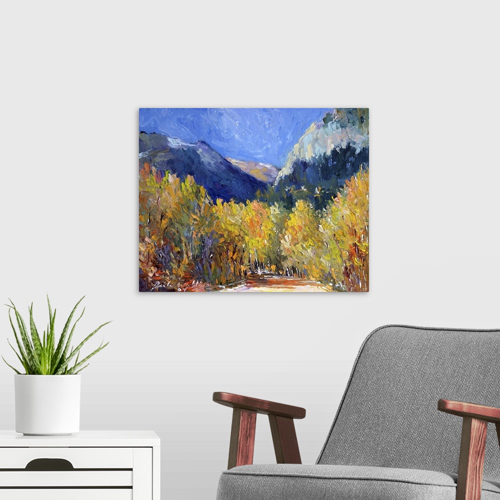 A modern room featuring Painting of an idyllic wilderness scene in autumn foliage.