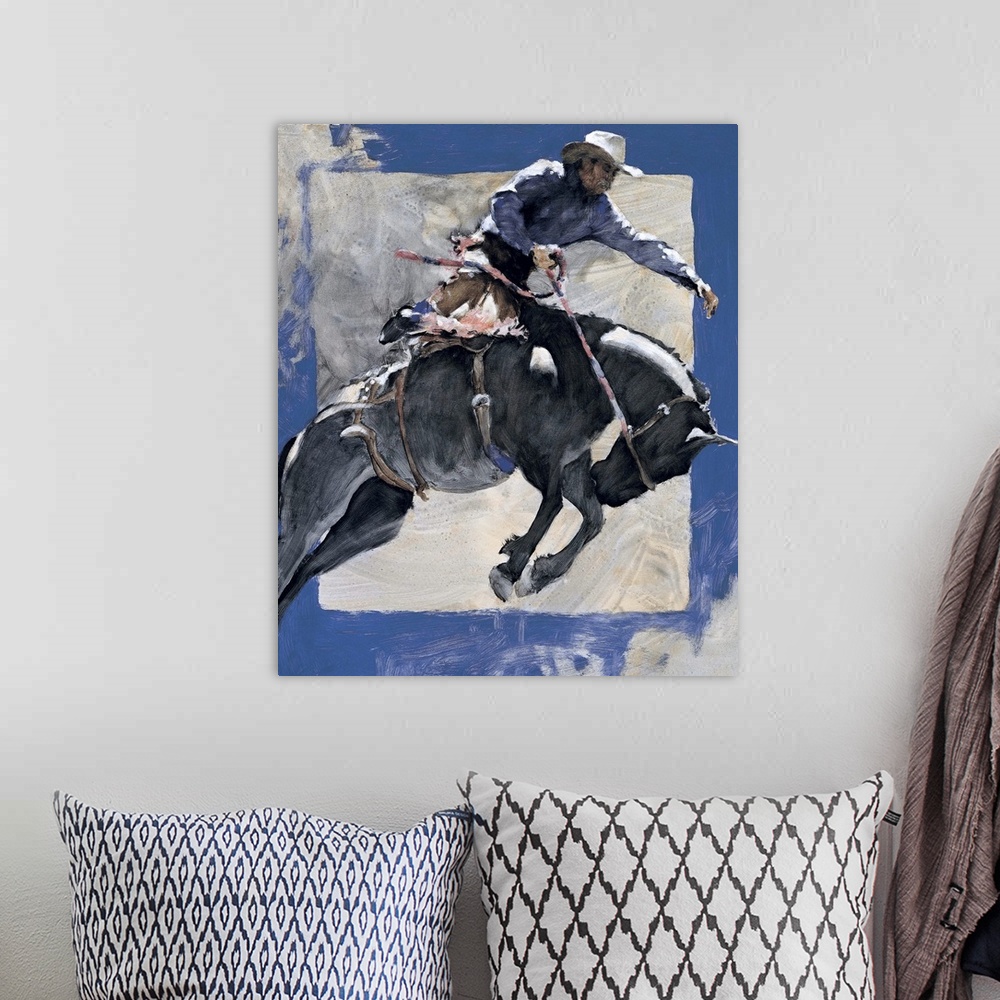 A bohemian room featuring Western themed contemporary painting of a cowboy riding a bucking bronco.