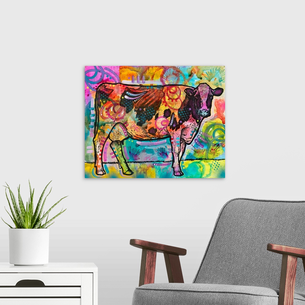 A modern room featuring Colorful painting of a cow looking straight at you with abstract designs all over.