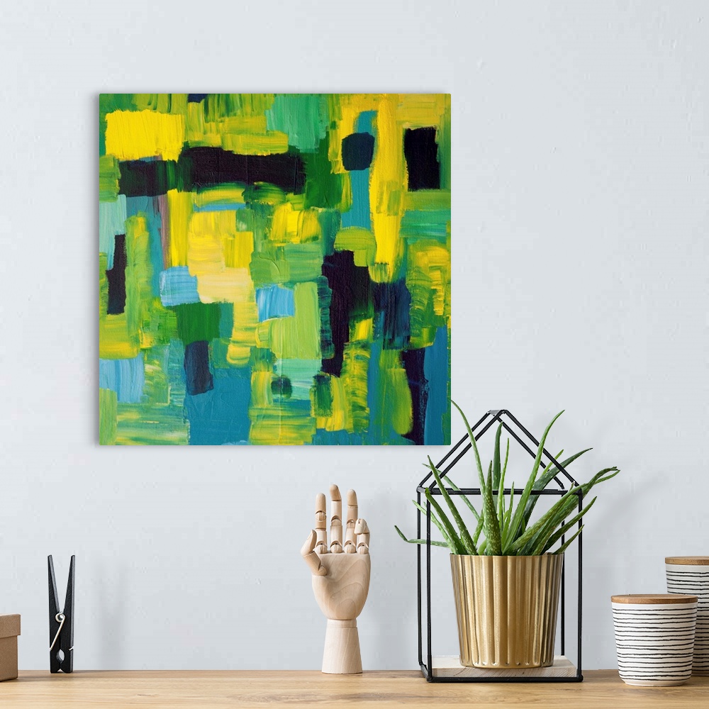 A bohemian room featuring Contemporary abstract painting in yellow and blues.