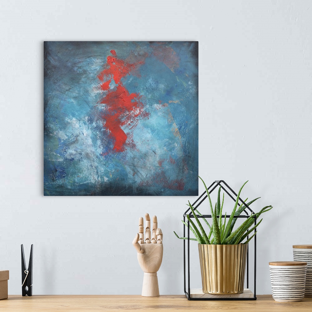 A bohemian room featuring Abstract contemporary painting with a large red center on blue.