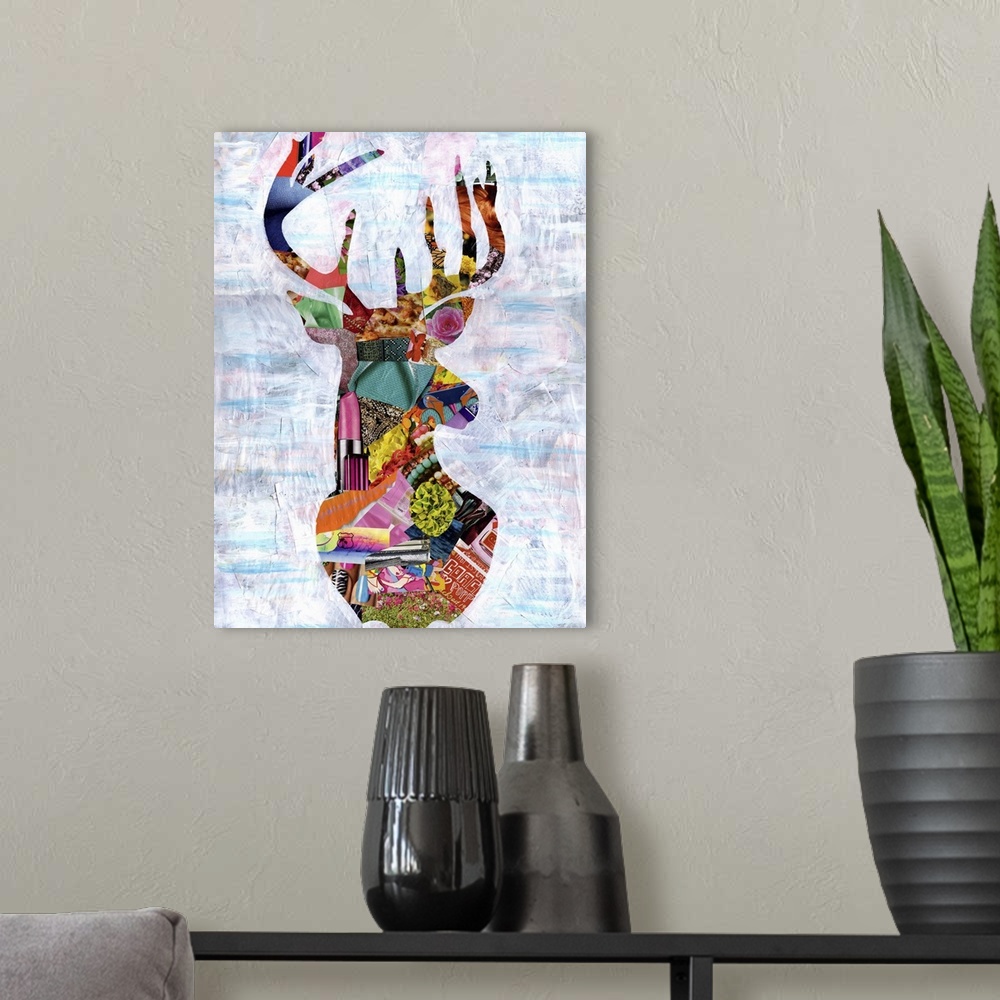 A modern room featuring Multimedia collage of magazine clippings and paint of the head and antlers of a buck.