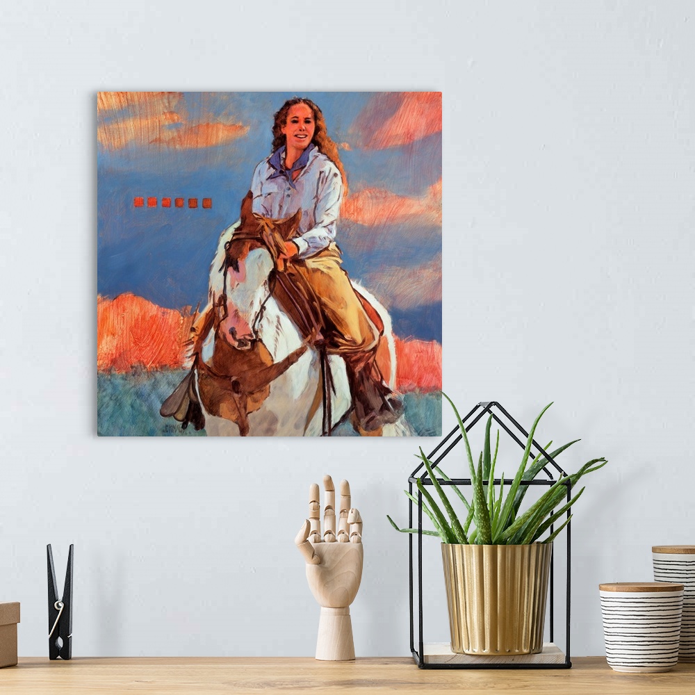 A bohemian room featuring Contemporary western theme painting of a cowgirl on horseback.