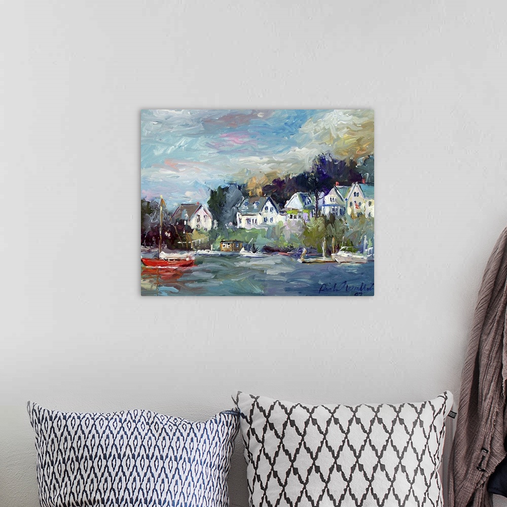 A bohemian room featuring Contemporary painting of a small coastal town harbor.