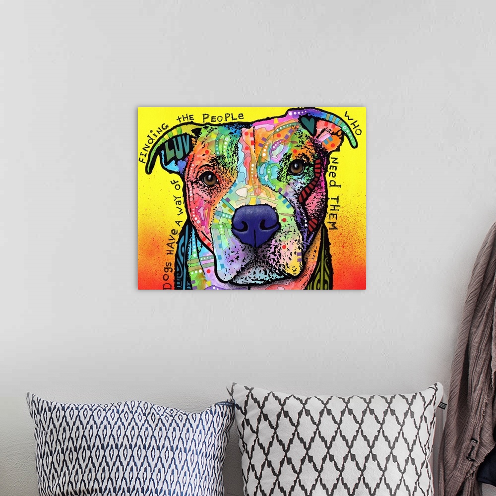 A bohemian room featuring "Dogs Have a Way of Finding the People Who Need Them" handwritten around a colorful painting of a...
