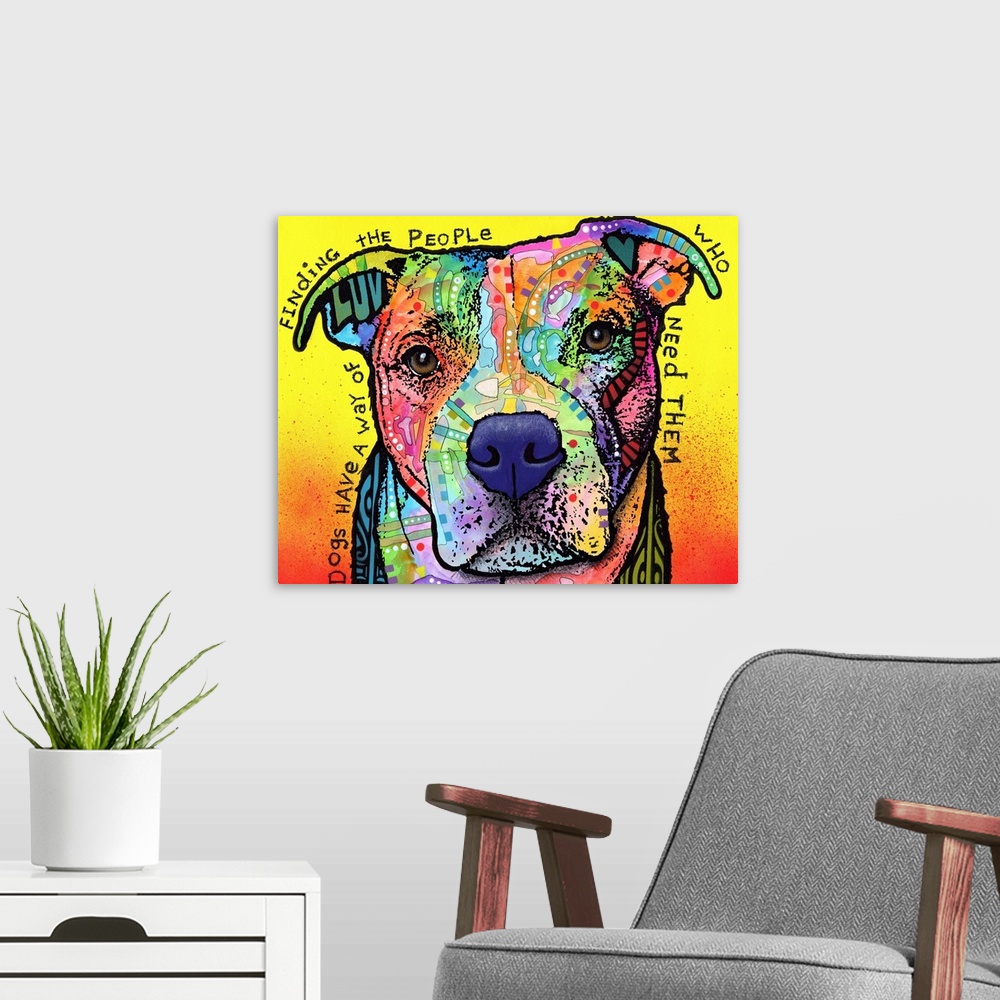 A modern room featuring "Dogs Have a Way of Finding the People Who Need Them" handwritten around a colorful painting of a...