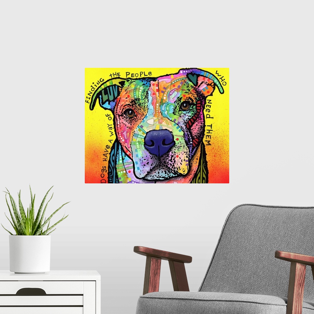 A modern room featuring "Dogs Have a Way of Finding the People Who Need Them" handwritten around a colorful painting of a...