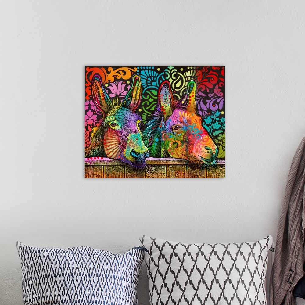 A bohemian room featuring Vibrant painting of two donkeys with their heads over a fence and abstract designs all over them ...