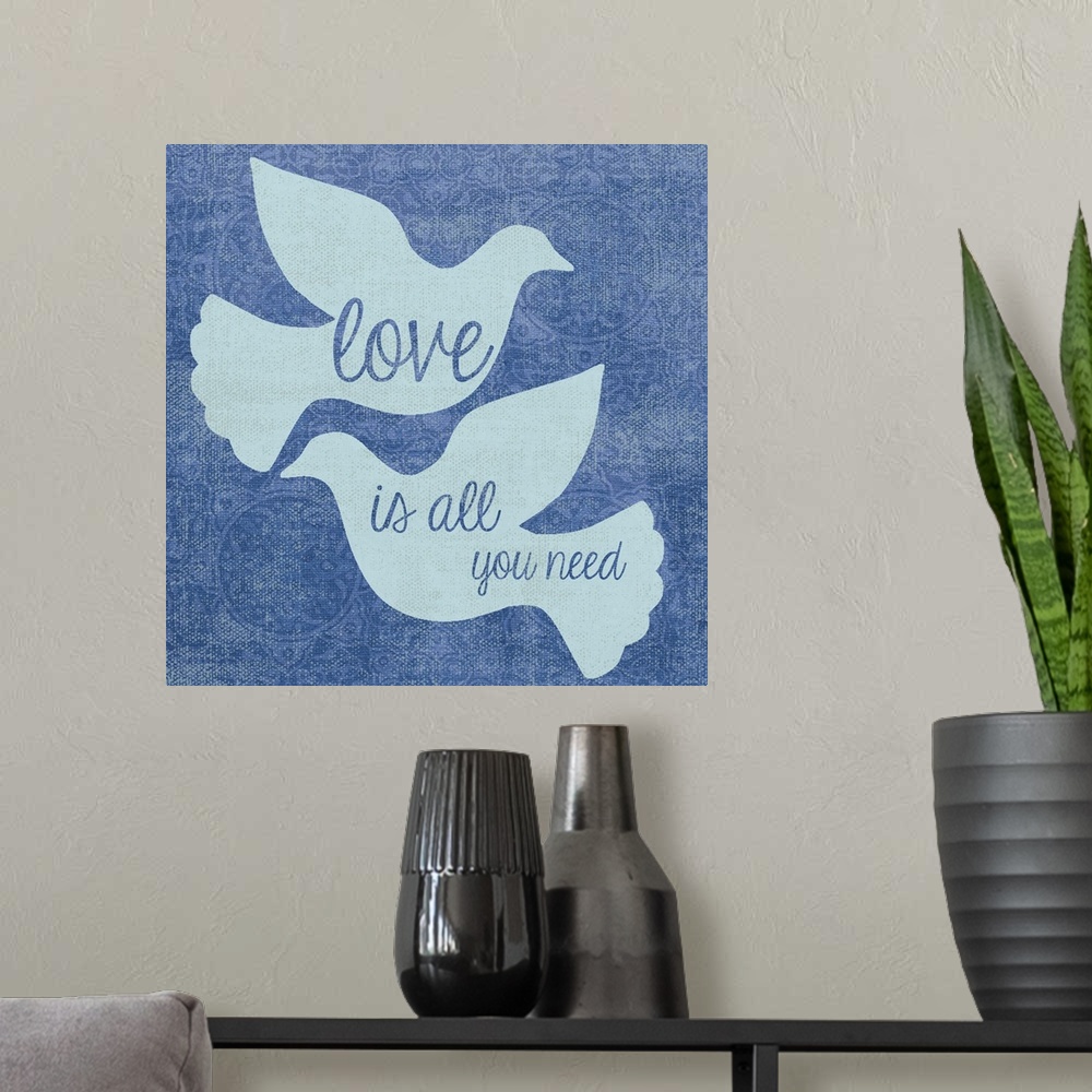 A modern room featuring two doves, love is all you needinspirational