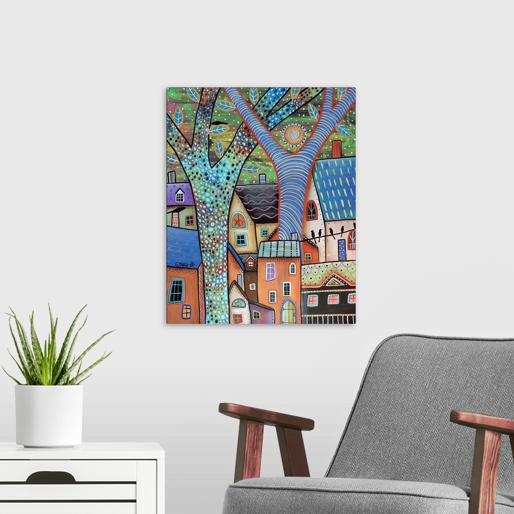 A modern room featuring Contemporary painting of a village made of different colored houses with large colorful trees.