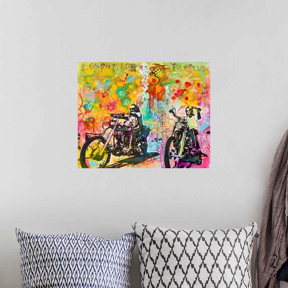 A bohemian room featuring "I Wasn't Born To Follow" hand etched at the top of a colorful illustration of Dennis Hopper and ...