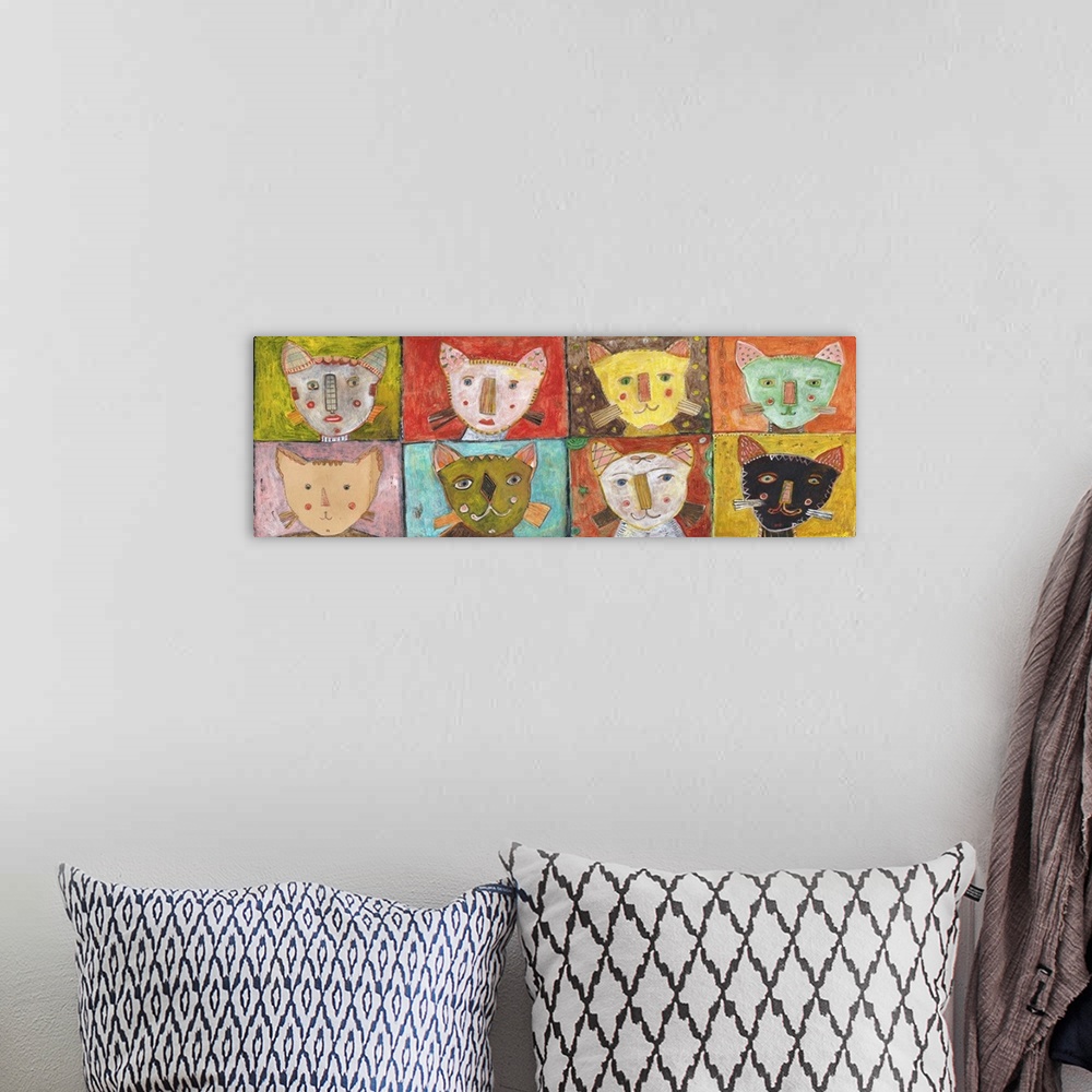 A bohemian room featuring Lighthearted contemporary painting of eight cats faces.