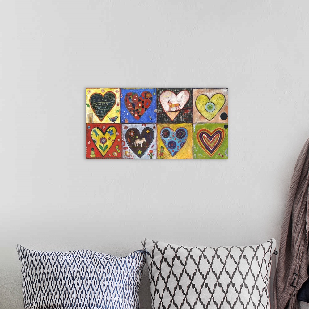 A bohemian room featuring Lighthearted contemporary painting of eight hearts against colorful backgrounds.