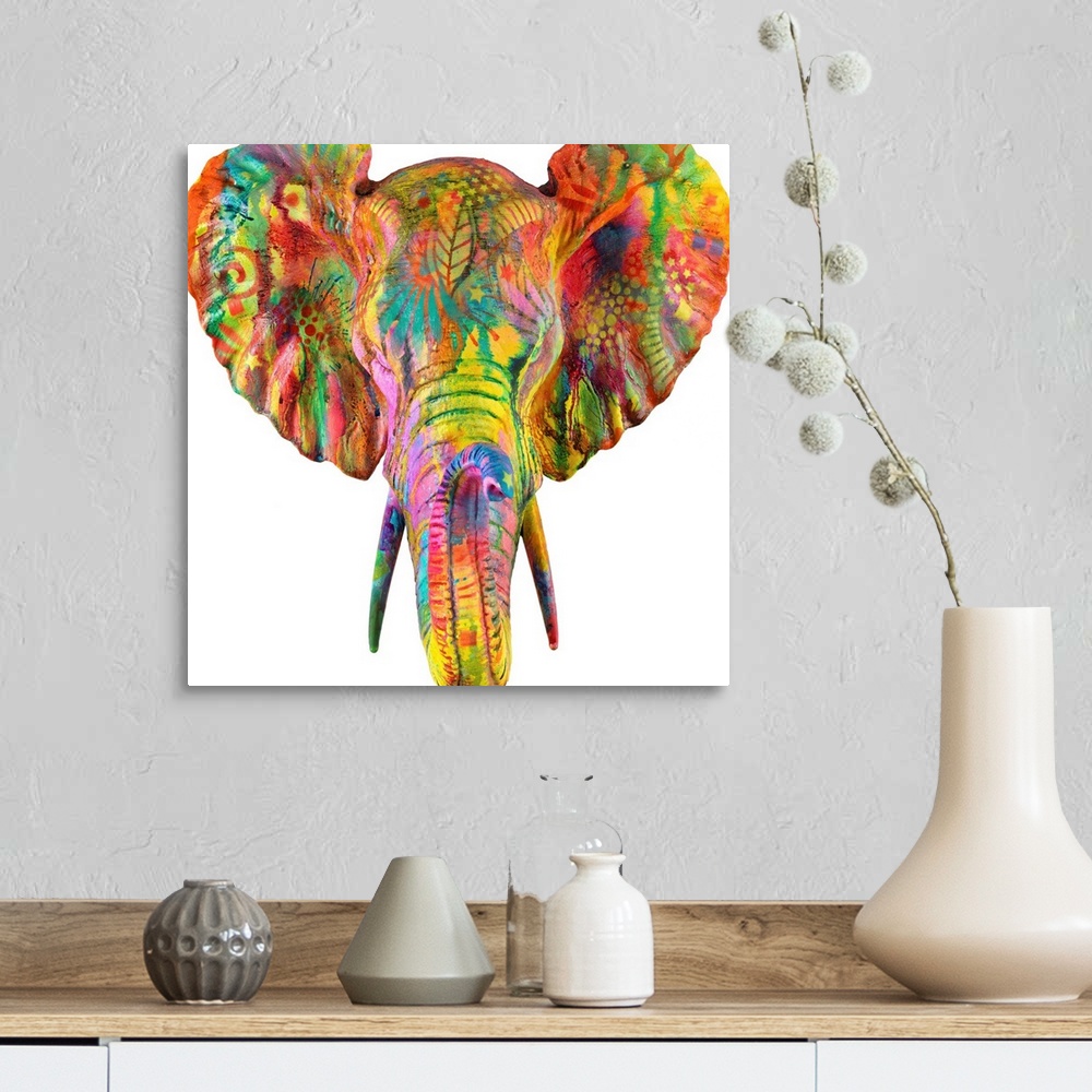 A farmhouse room featuring Colorful painting of an elephant's head and tusk covered in abstract designs on a sold white back...