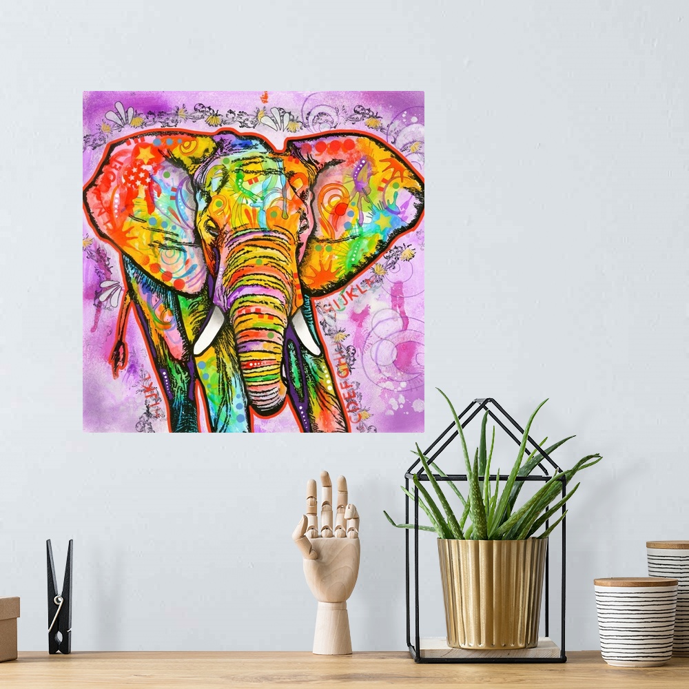 A bohemian room featuring Square painting of a colorful elephant with abstract markings on a busy purple background.
