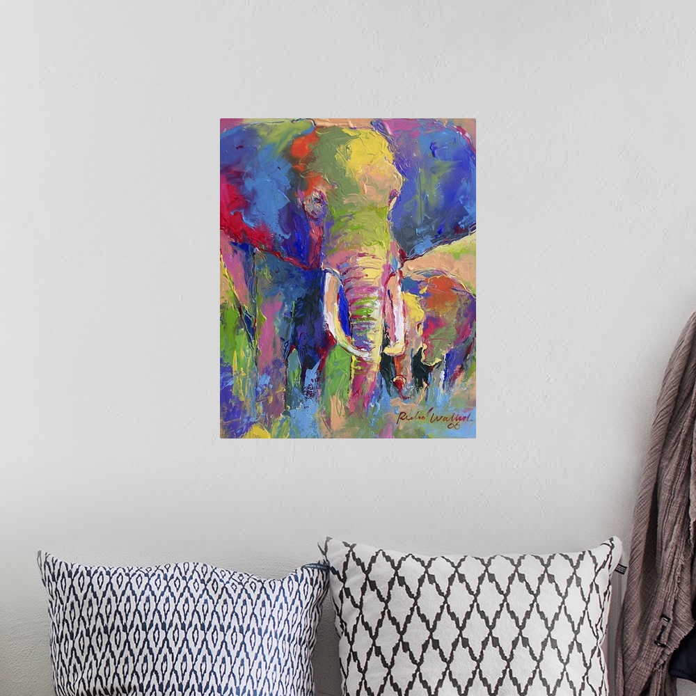 A bohemian room featuring Contemporary vibrant colorful painting of an elephant.