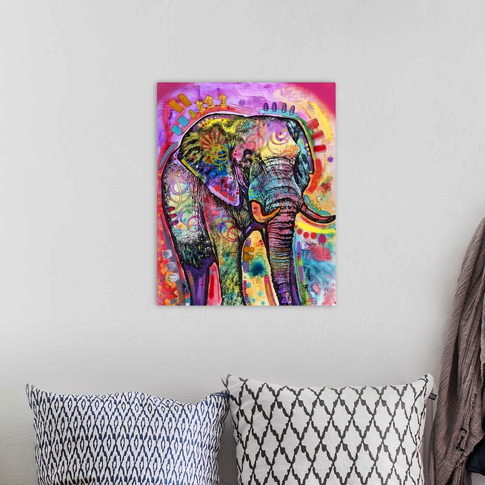 A bohemian room featuring Colorful illustration of a large elephant with abstract markings all over.