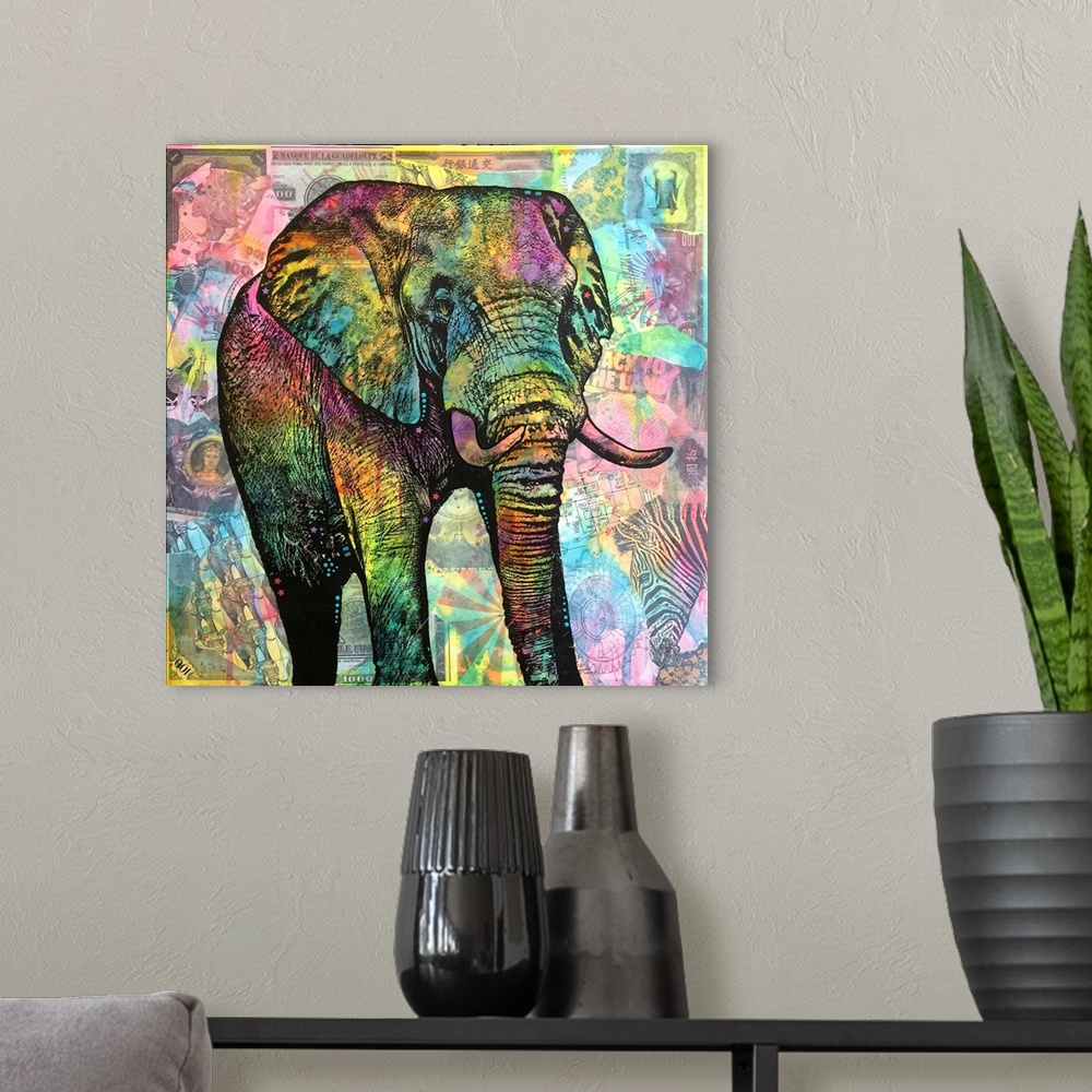 A modern room featuring Square illustration of a colorful elephant on top of a collage of African image themed cut outs.