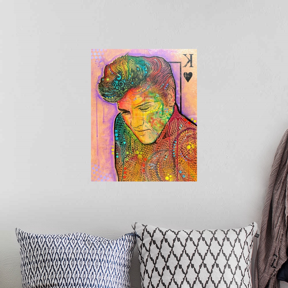 A bohemian room featuring Pop art style illustration of Elvis on the King of Hearts playing card with various colors and de...