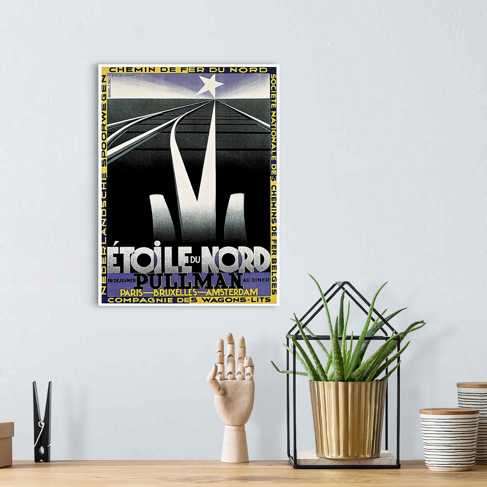 A bohemian room featuring Vintage advertisement artwork for Etoile du Nord rail travel.