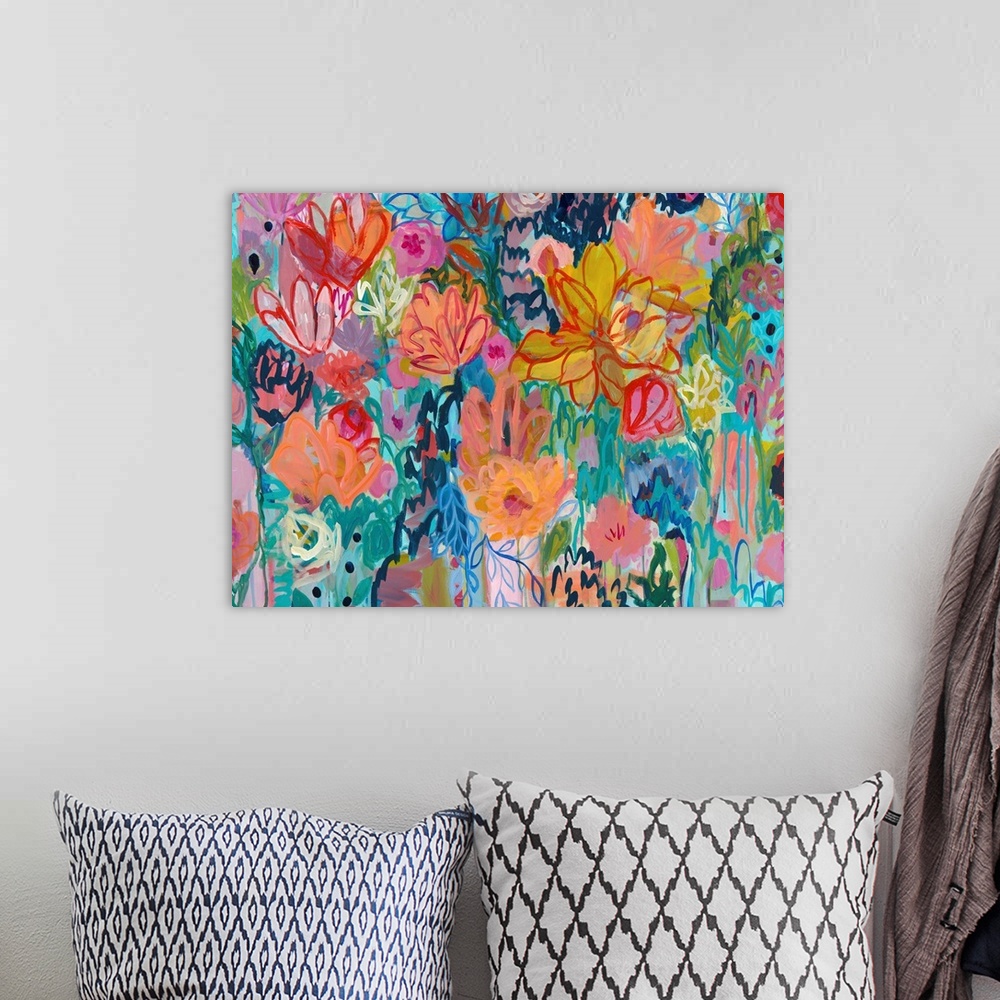 A bohemian room featuring Contemporary painting of vibrantly colored flowers.