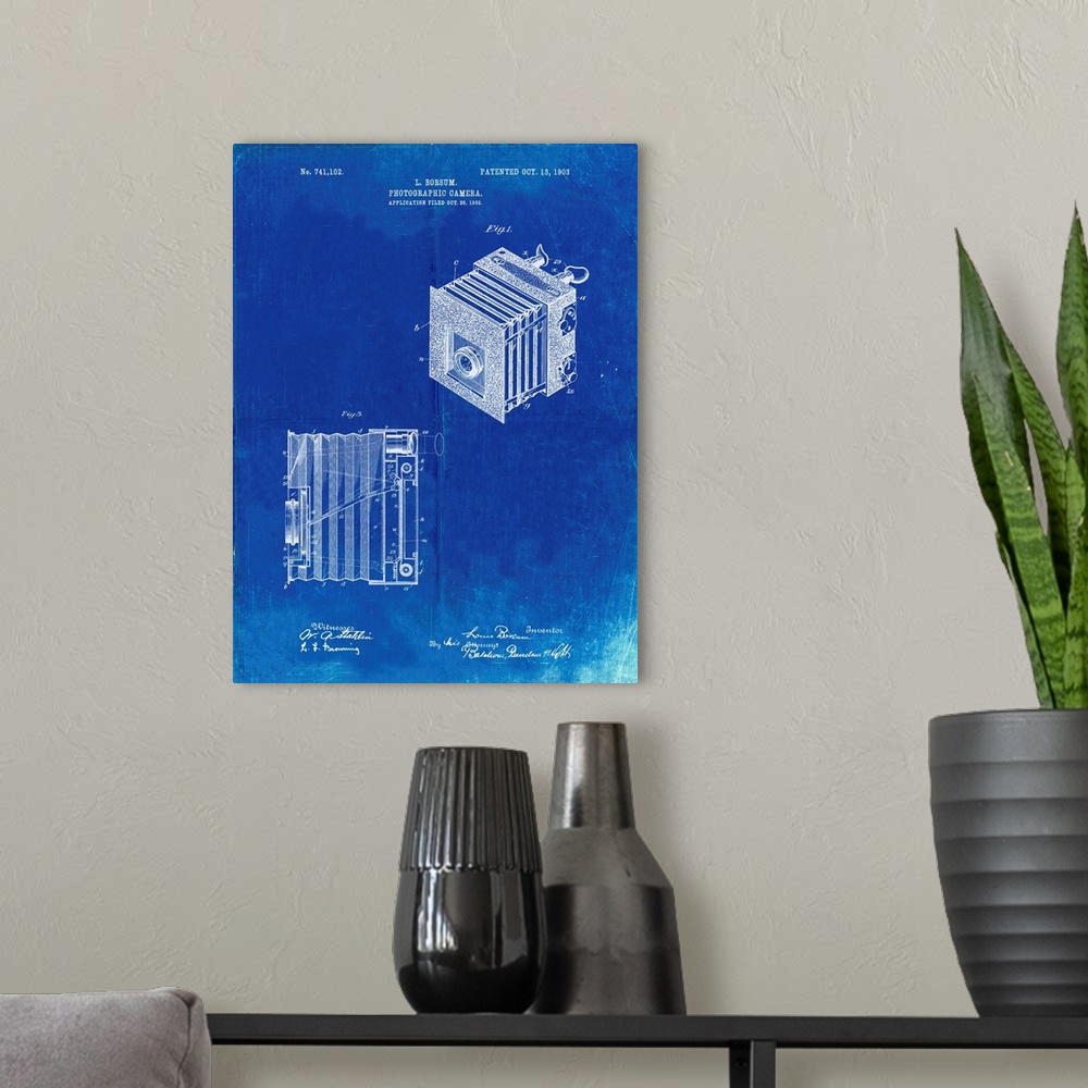 A modern room featuring Faded Blueprint Borsum Camera Co Reflex Camera Patent Poster