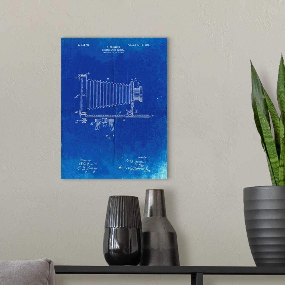 A modern room featuring Faded Blueprint Photographic Camera Patent Poster