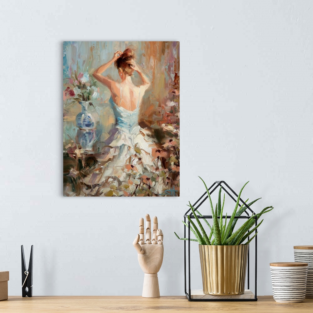 A bohemian room featuring A contemporary piece of artwork of the back side of a woman in a white dress who is putting up he...