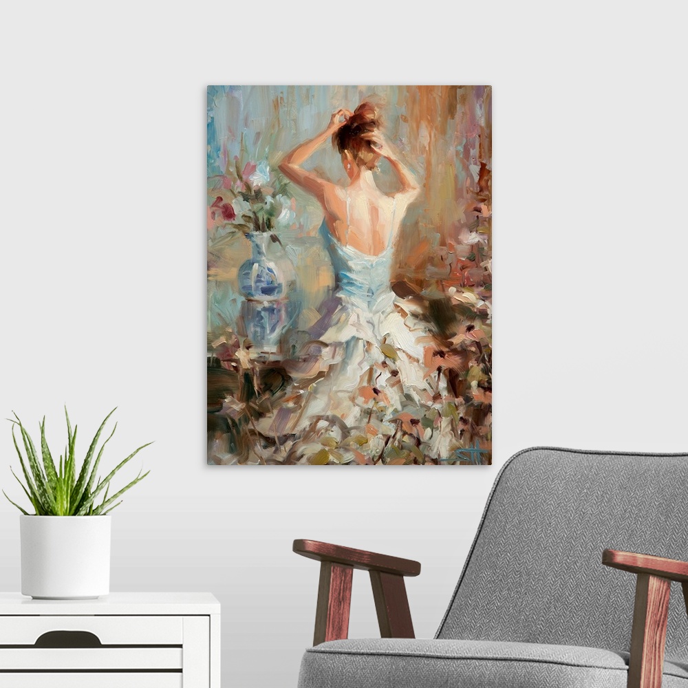 A modern room featuring A contemporary piece of artwork of the back side of a woman in a white dress who is putting up he...