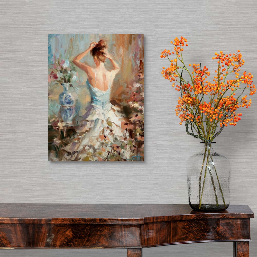 A traditional room featuring A contemporary piece of artwork of the back side of a woman in a white dress who is putting up he...