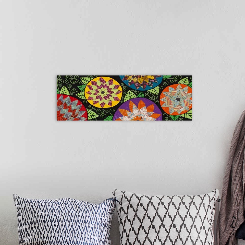 A bohemian room featuring Painting of five round flowers with colorful patterns and triangular leaves.
