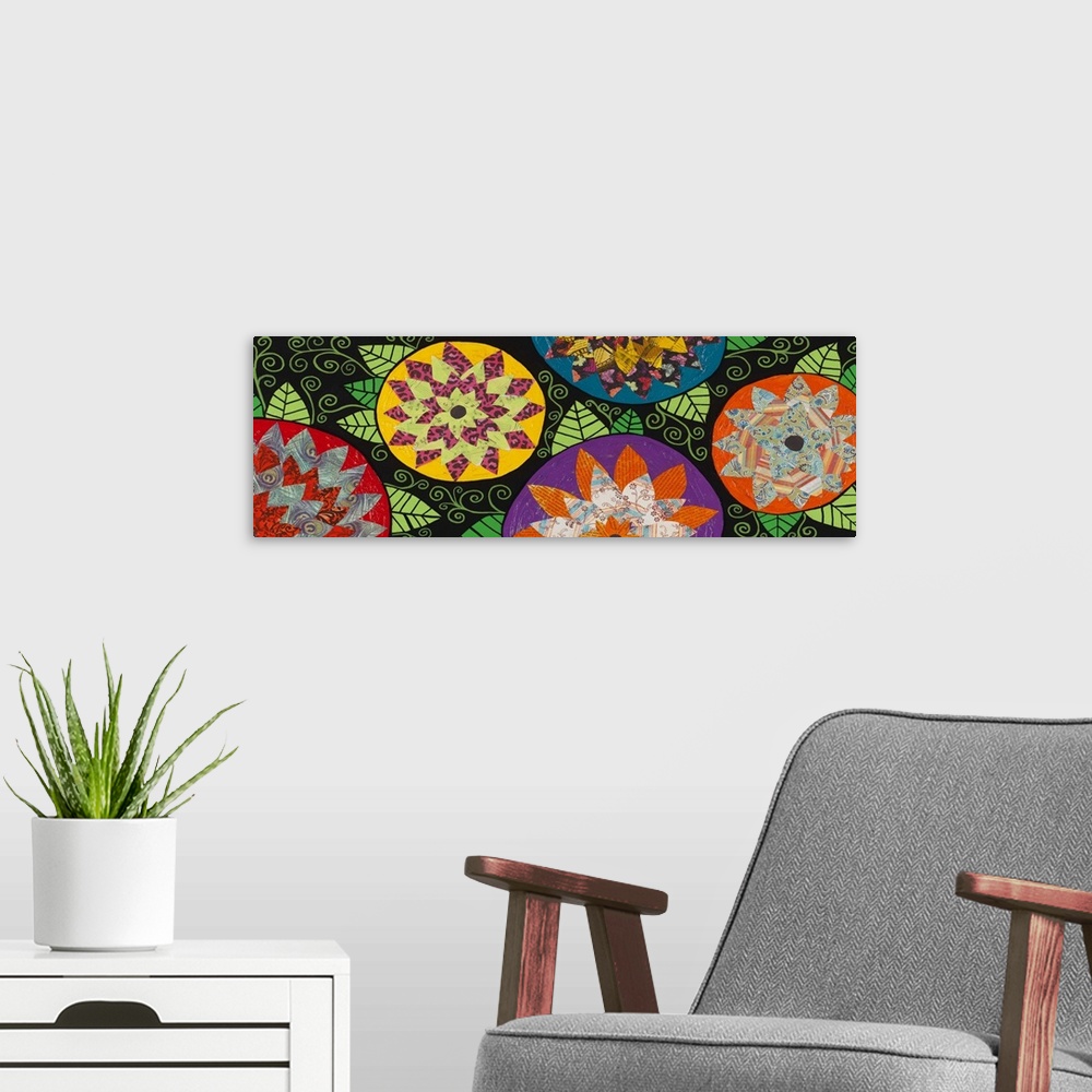 A modern room featuring Painting of five round flowers with colorful patterns and triangular leaves.