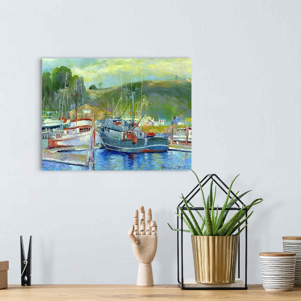 A bohemian room featuring Harbor filled with fishing boats.