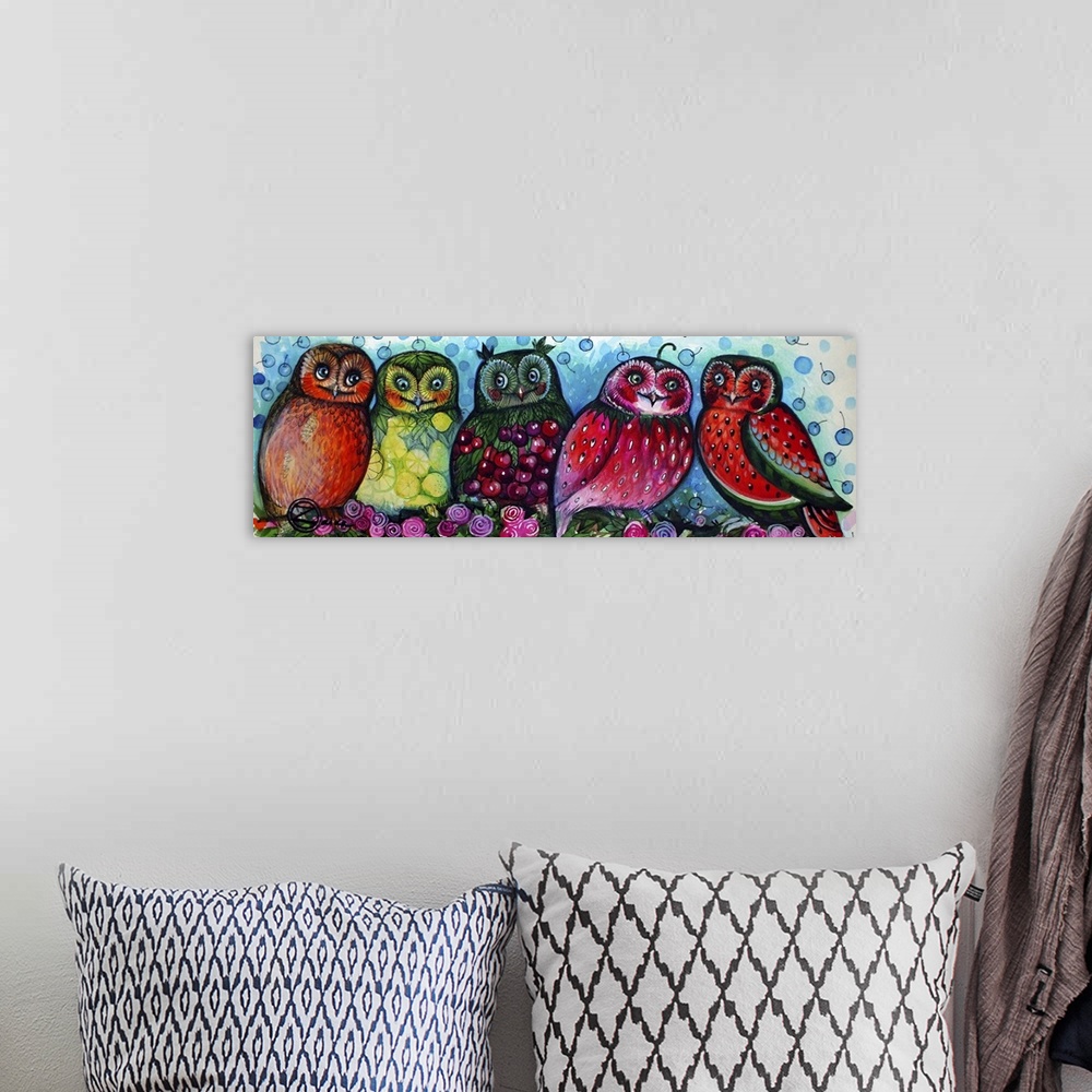 A bohemian room featuring Contemporary painting of five owls painted with different fruit patterns.