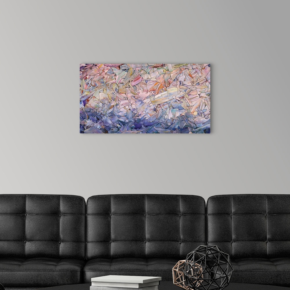 A modern room featuring Abstract artwork in the colors of a seascape at dawn.