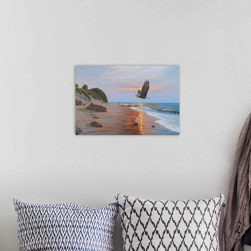 A bohemian room featuring Contemporary artwork of an Eagle in flight over a beach at sunset
