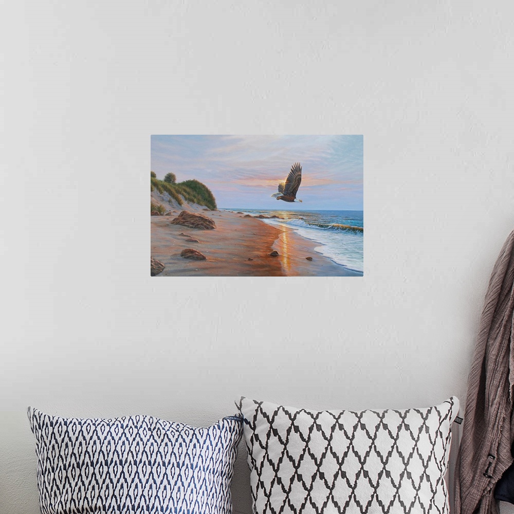 A bohemian room featuring Contemporary artwork of an Eagle in flight over a beach at sunset
