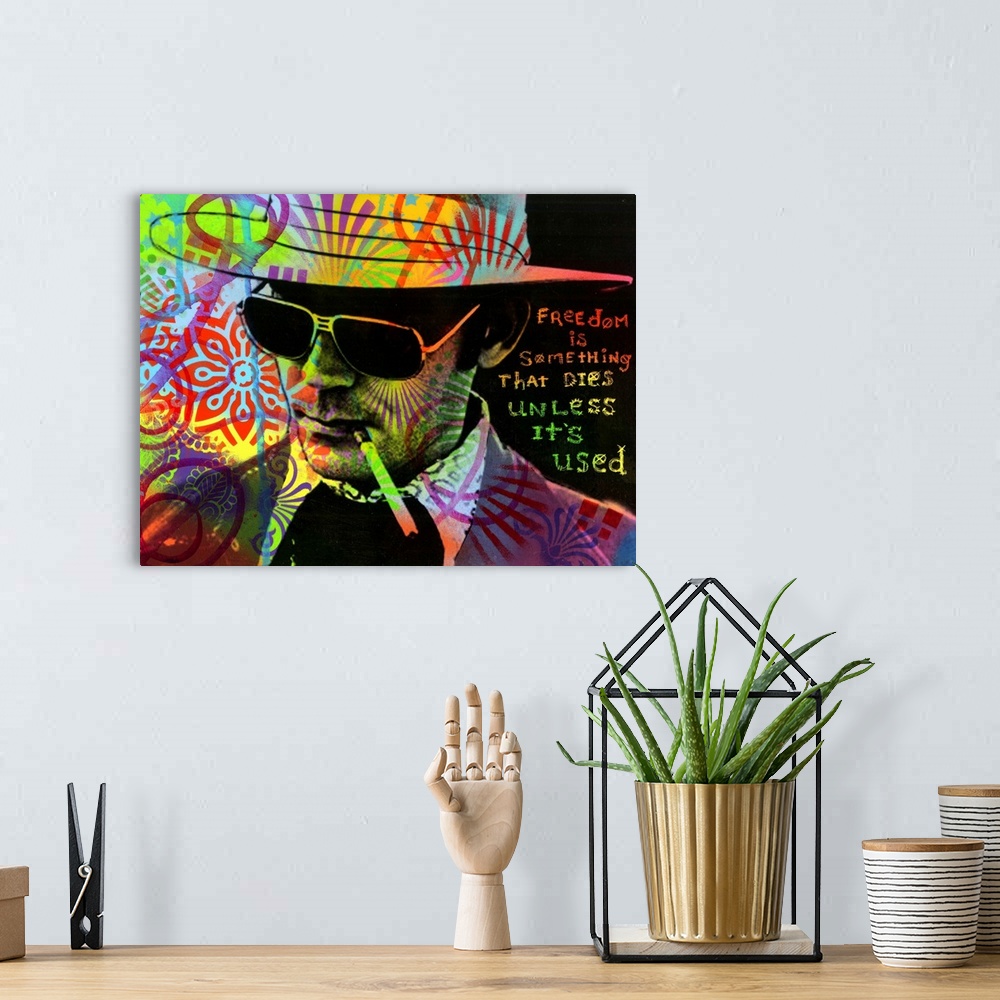 A bohemian room featuring Portrait of Hunter S. Thompson smoking a cigarette with a colorful graffiti overlay and "Freedom ...