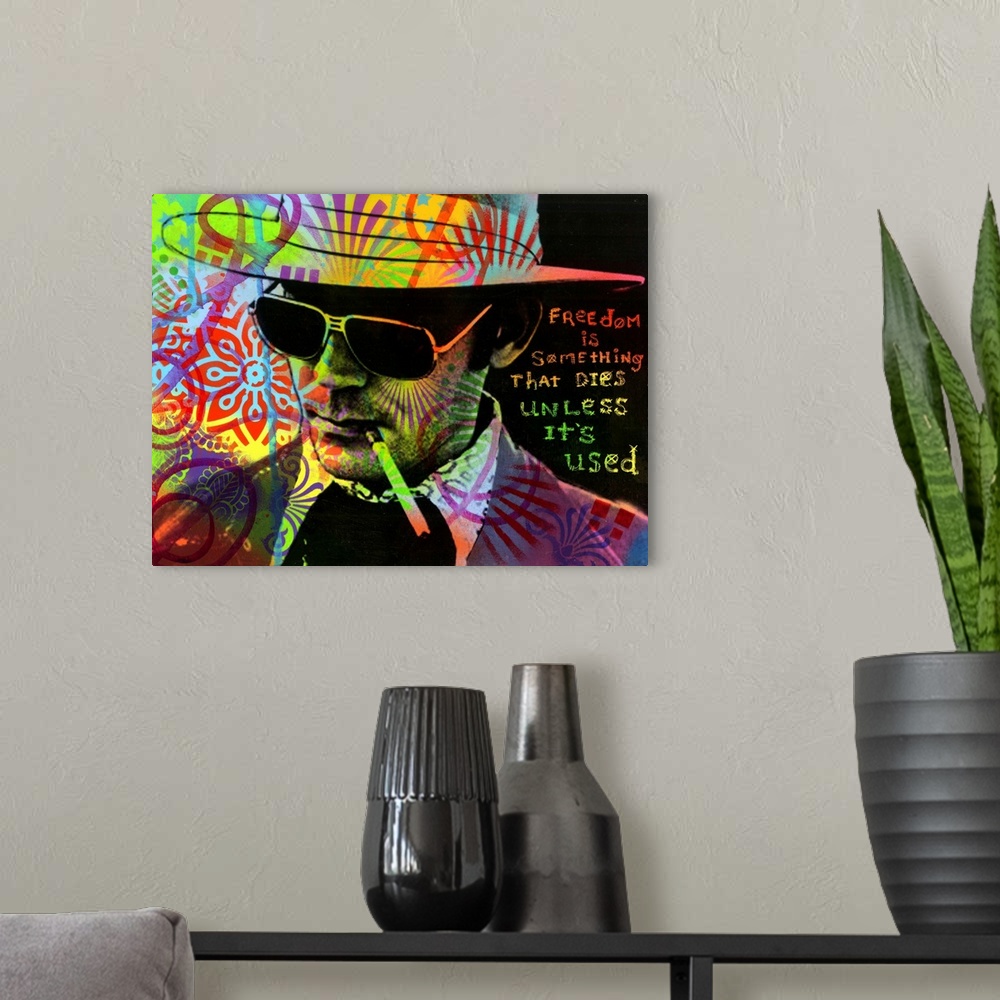A modern room featuring Portrait of Hunter S. Thompson smoking a cigarette with a colorful graffiti overlay and "Freedom ...